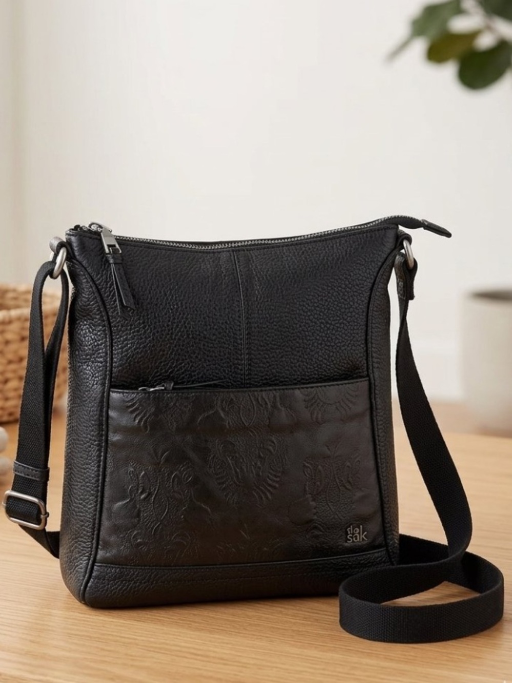 The Sak Lucia Black Pebbled Leather Crossbody Bag adjustable strap